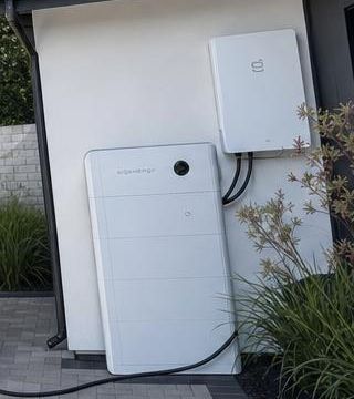 Sigenergy SigenStor battery and inverter installed on the side of a home